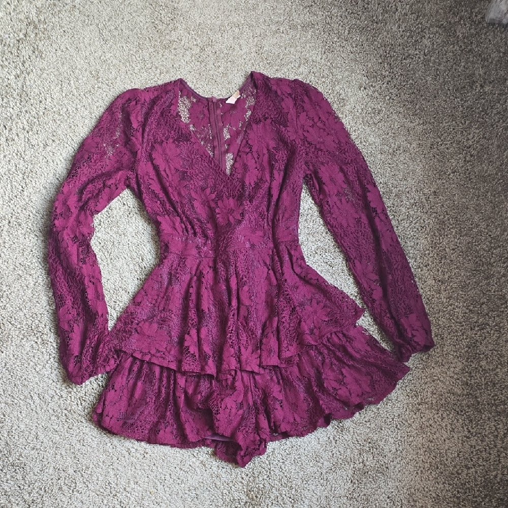 Lace Peplum Long-Sleeve Romper in Berry